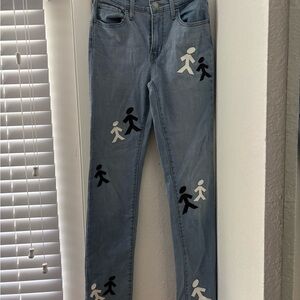 Hand Decorated by Baira- light blue jeans with people figures